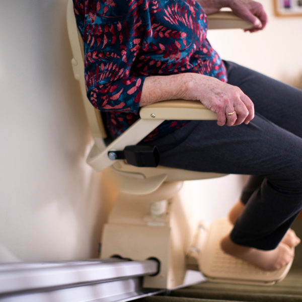 woman using stairlift